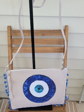 Neutral Crossbody Bag with Blue Sequin Evil Eye Accent